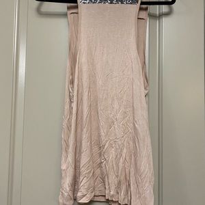 Size medium tank , never worn ,